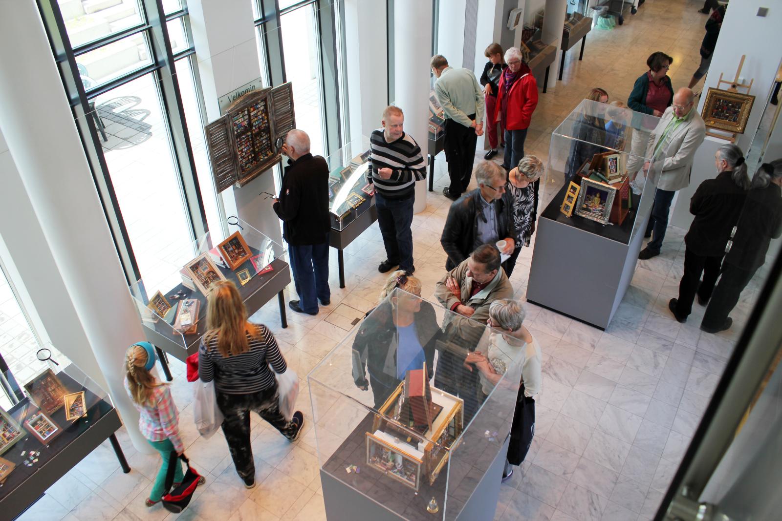 From an exhibition with the small books (Fairy Books) made by Gulli Ara, lot of people walking around