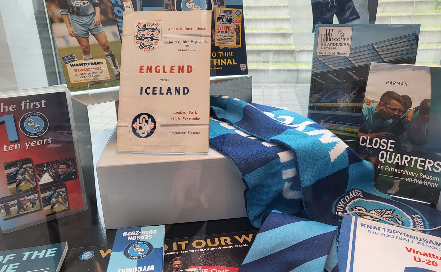 Books, tickets, scarf and other memorabilia connected to Wycombe Wanderers