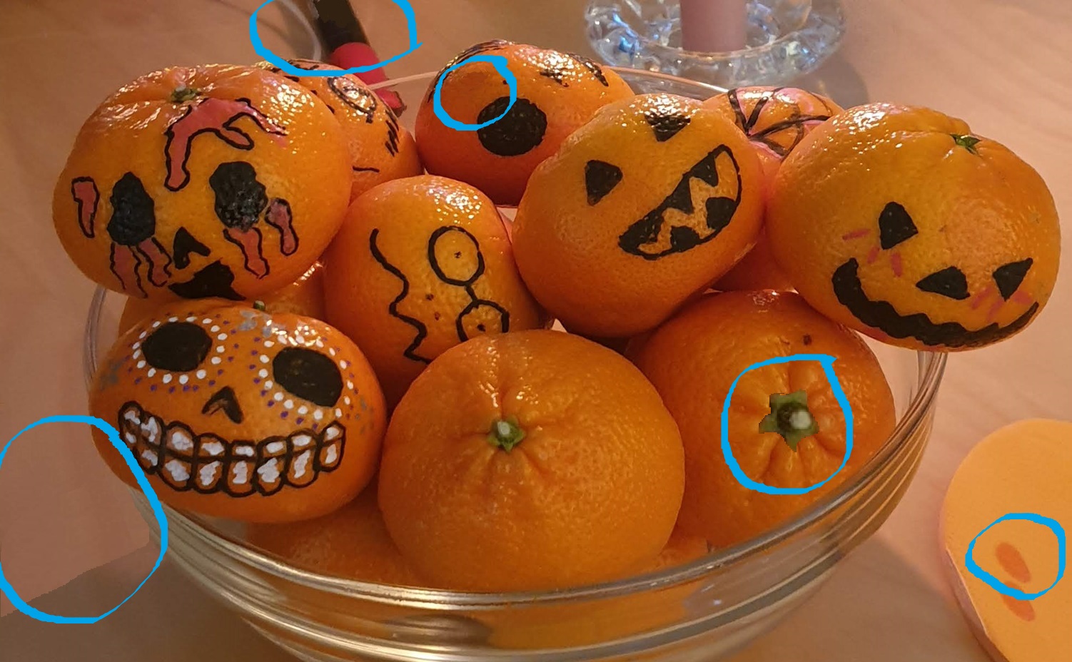 Mandarins in a bowl, painted in pumpkin Halloween style